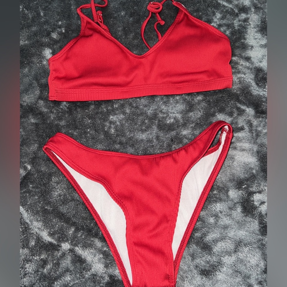 Never worn , cherry red.